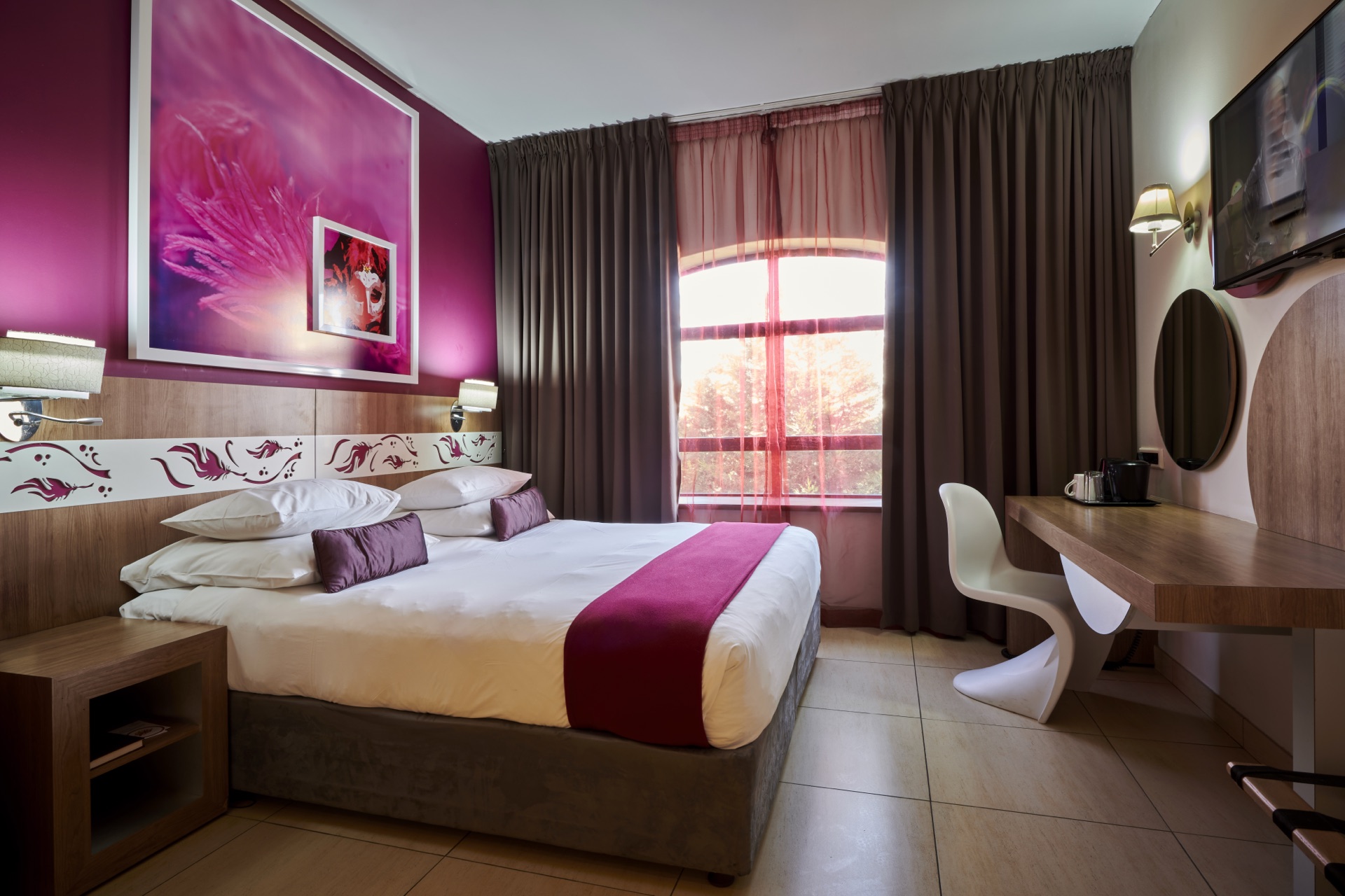 Classic King room with king bed, work desk and arched window at Rio, Klerksdorp