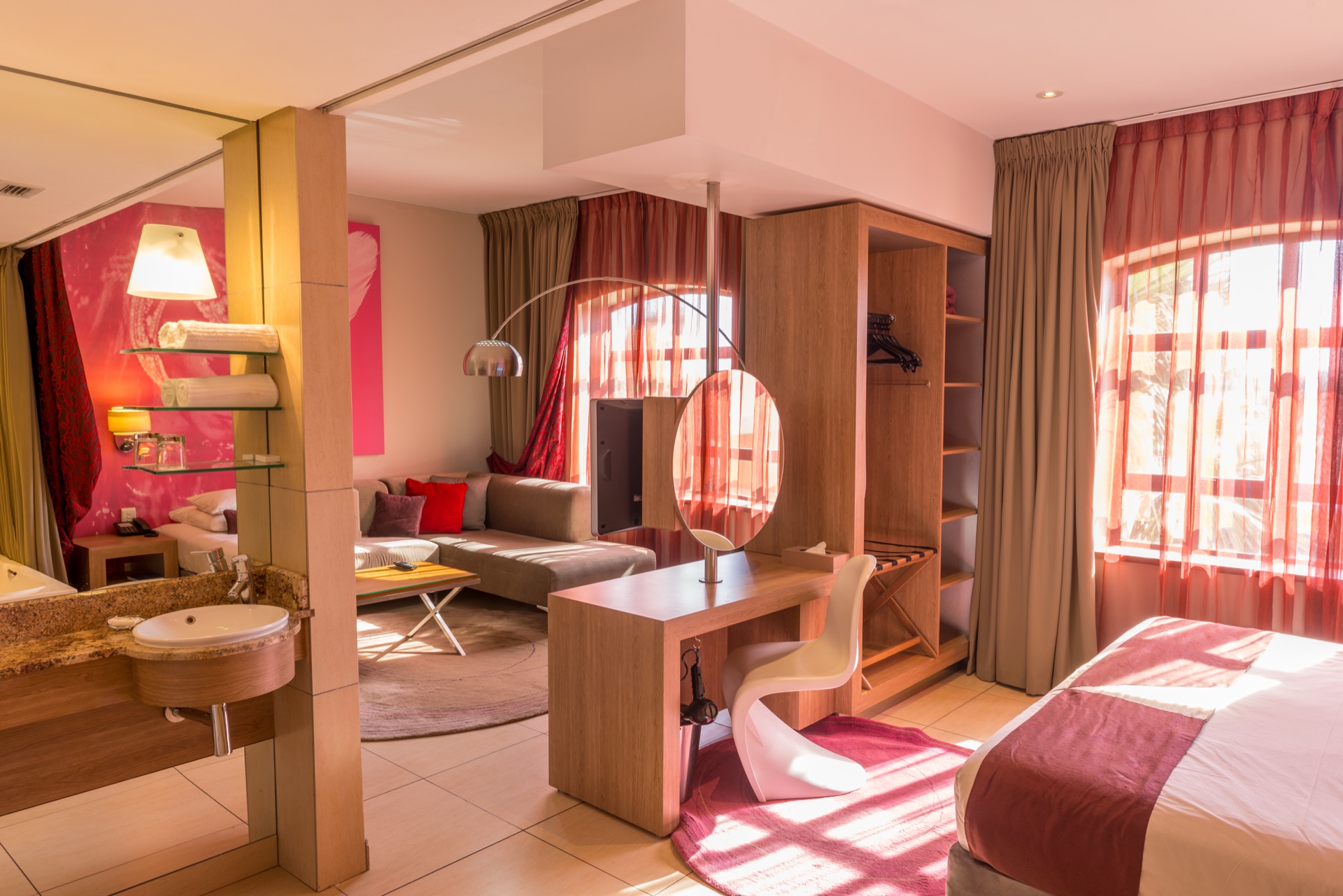 Executive Suite with twin vanities, lounge and king bedroom at Rio, Klerksdorp